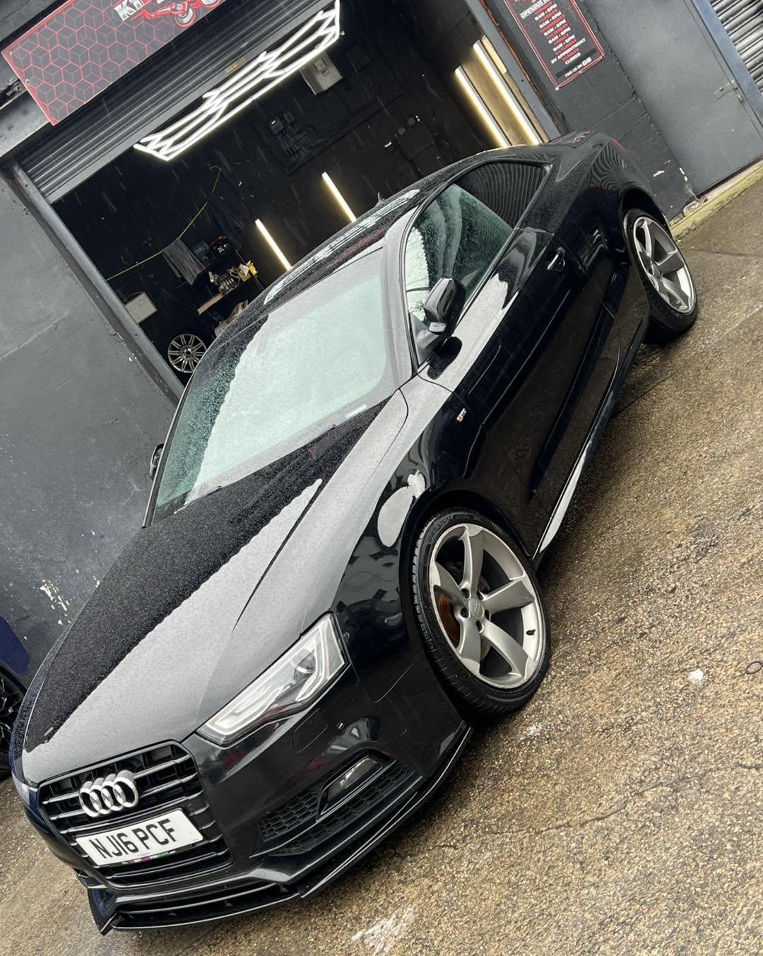 Black Audi A5 gleaming outside the K1 Detailing unit