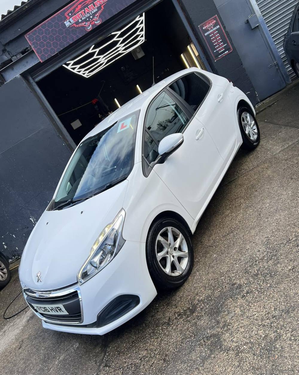 White Peugeot 208 outside the K1 unit after a full valet